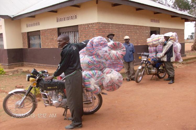 Mattresses are delivered by motorcycle to Avari Health Centre.